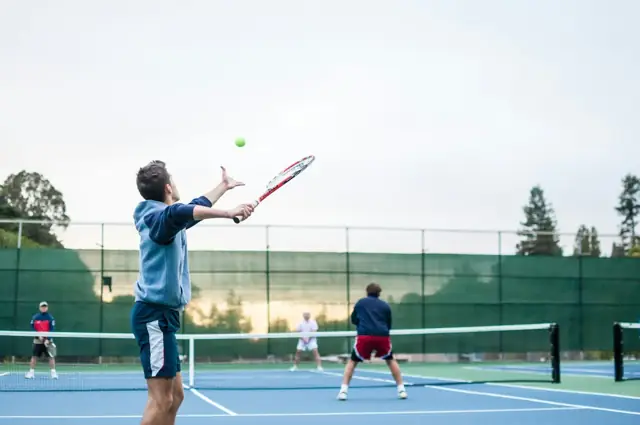 Players on a tennis court
